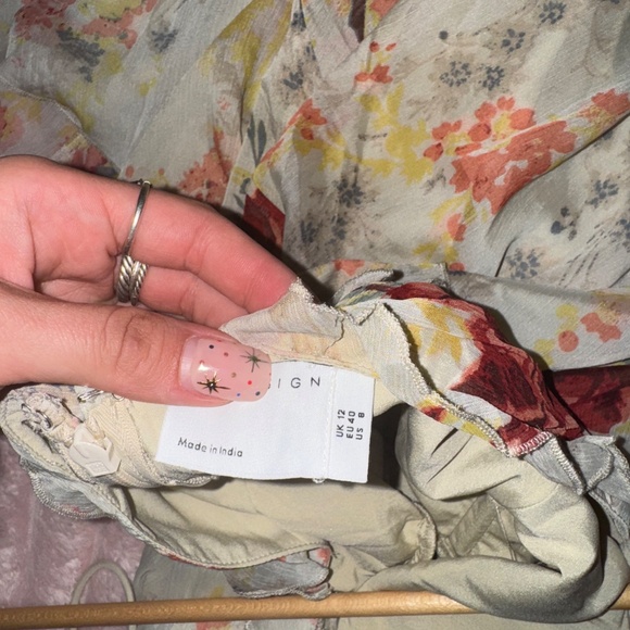 ASOS DESIGN halter ruffle maxi dress with high low hem in cream floral print - Picture 4 of 4